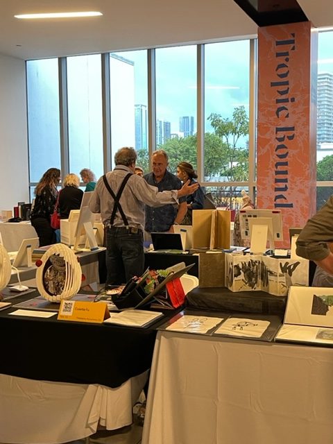 Solmentes Press and a view to Miami from the Design District's Paradise Plaza at the Tropic Bound Artist Book Fair.